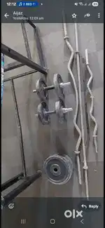 Gym stand for sale with weights.