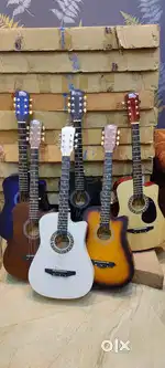 Selling New Intern acoustic guitar at resonable price descriptionbelow
