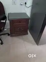 Dressing table with mirror and small wooden cash box.