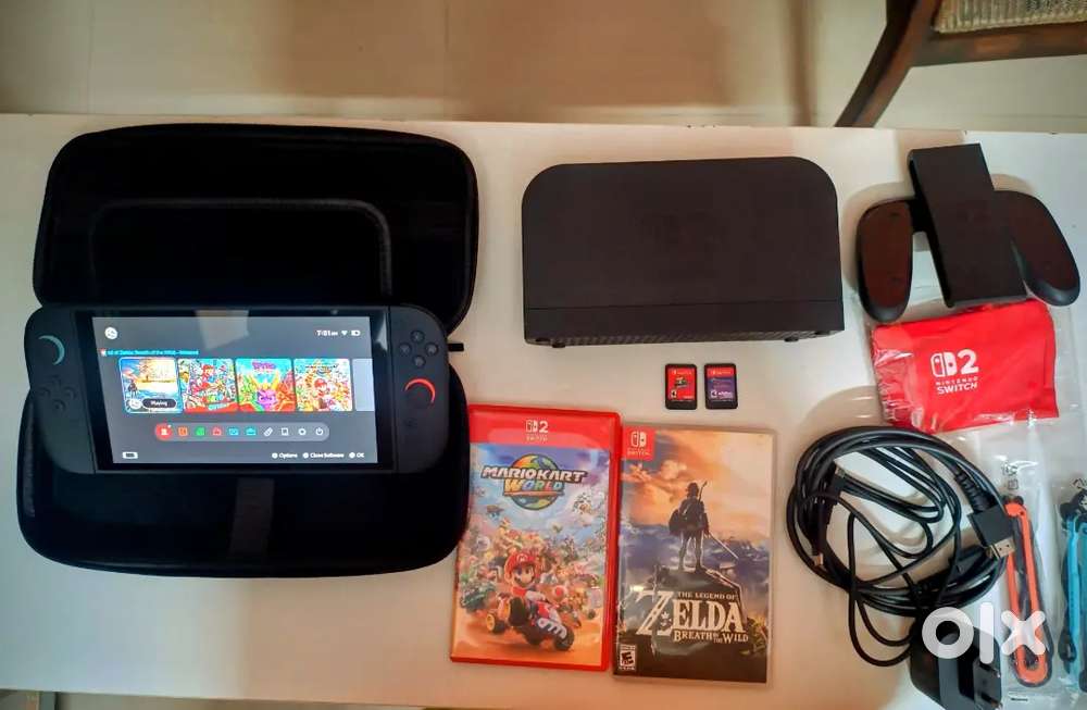 Nintendo Switch 2 +4 Games + case  4 Months Old  Excellent Condition