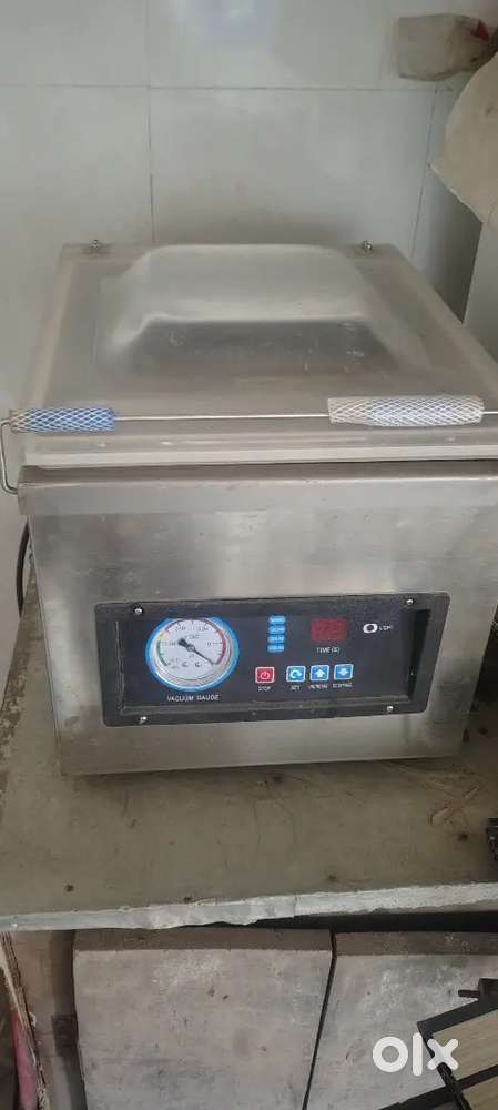Packing and vaccum machine