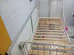 Kids bed with white metal frame