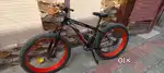 Just like scratchlessNew red coloured fat bicycle like