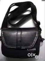 Black Canon PowerShot Point-and-shoot Camera