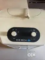 Cooler with ice box facility
