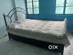 ALMOST NEW and PRICED LOW!! HEAVY DUTY Wrought Iron Bed with Storage