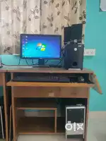 DESKTOP COMPUTER WITH TABLE AND SPEAKER