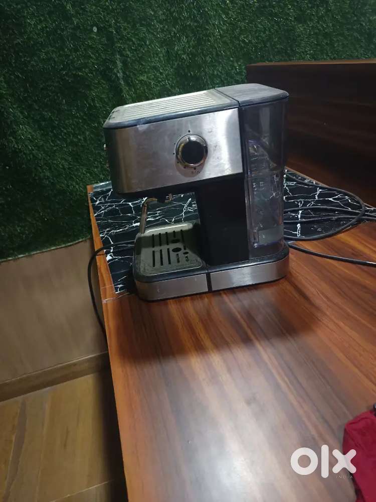 A pizza oven and coffee machine