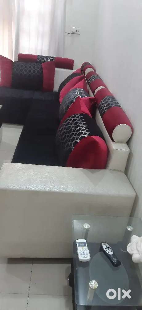 14 seat sofa, with glass top center table, curtains, 8 large cushions