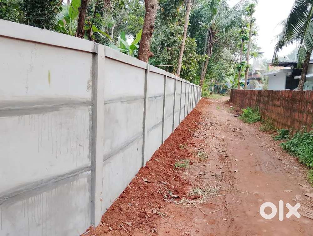 Fencing slab wall chain link fencing