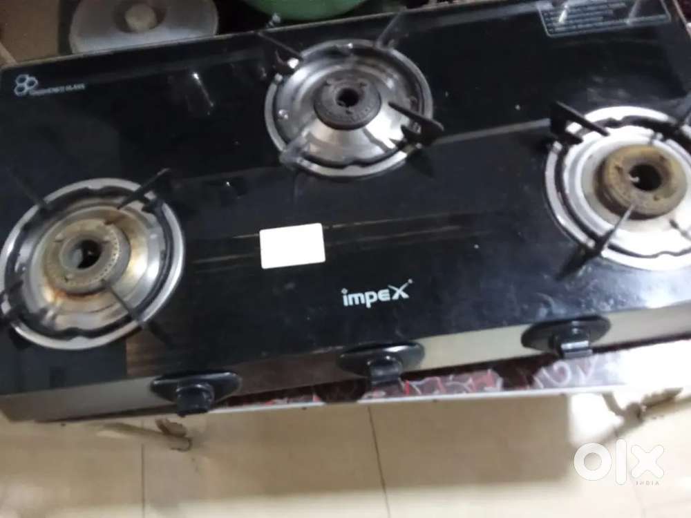 Glass top three burner stove for sale at krishna puram Thrissur