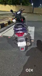 Ladies driving scooty