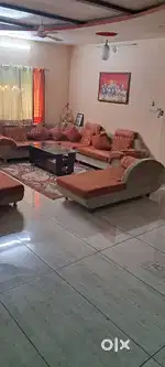 Sofaset Cream Orange color well maintained  12 seater