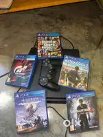 PS 4 with controller and 5 games