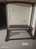 Antique indoor wooden swing