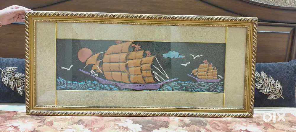 Golden framed canvas embossed painting