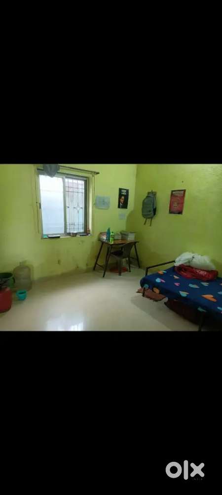 Room with bed and fan need boy for room partner