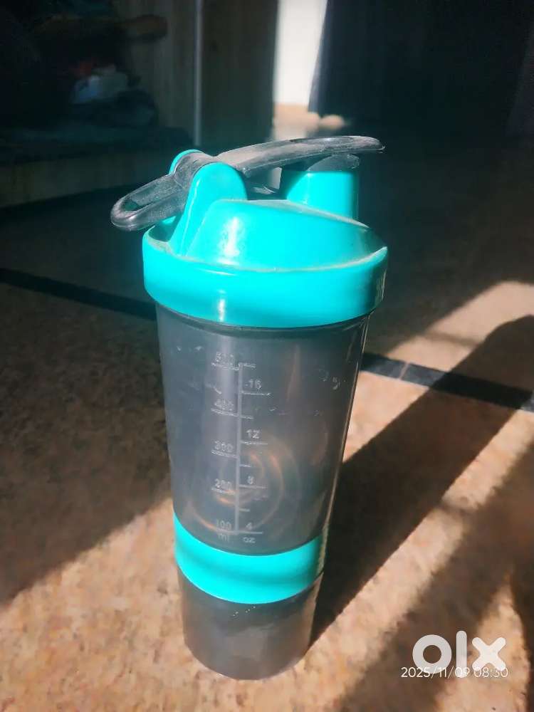 Shaking bottle for making milk shake and mix the protein