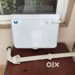 Unused flush tank with accessories