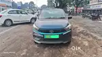 Ola uber attached car. Tata tigor electric.