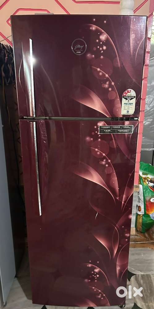 Godrej eon 3 star fridge maroon color good working condition