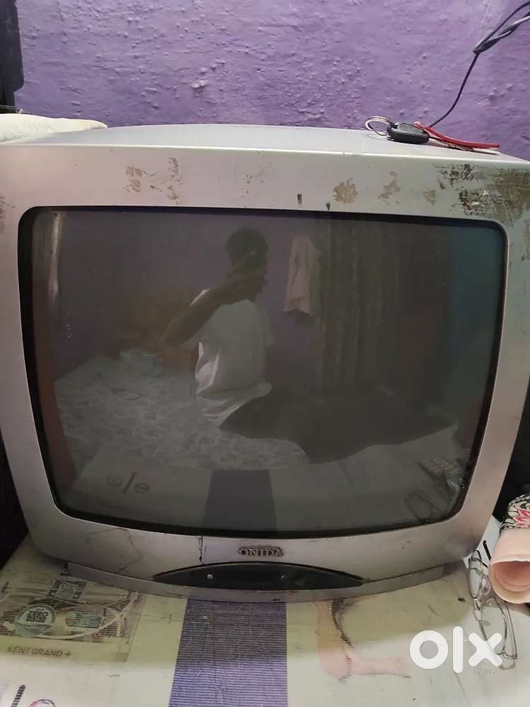 Tv.  TV   old-school TV perfect for retro gaming setups, collectors,