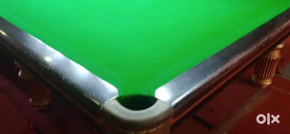 Pool table with sticks