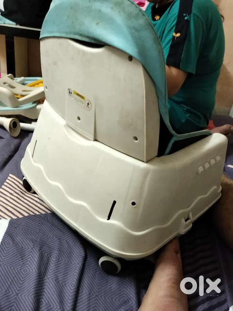 Kids chair attached with food table. It is useful product for kids