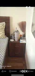 Queen sized storage bed with mattress and side table