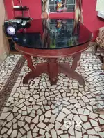 Wooden dining table with glass