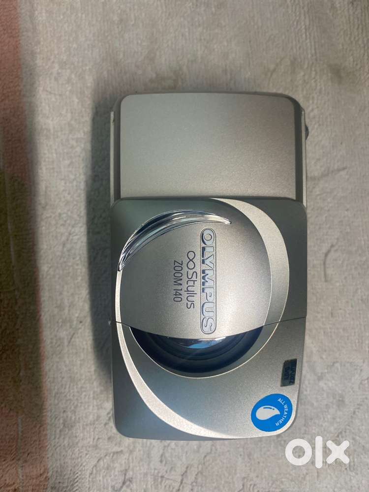 Olympus Stylus Zoom 140 is a fully automatic film camera