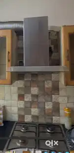 Kitchen chimney and gas stove