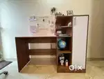 Study table with book storage cabinet