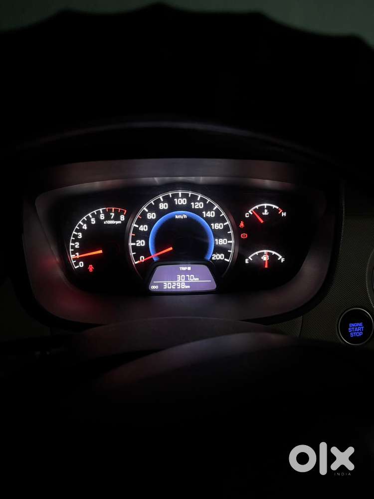 2014 Grand i10 Maroon colour.