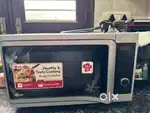 LG 28L Convection Microwave Oven 150 Auto Cook Menu, Black and silver
