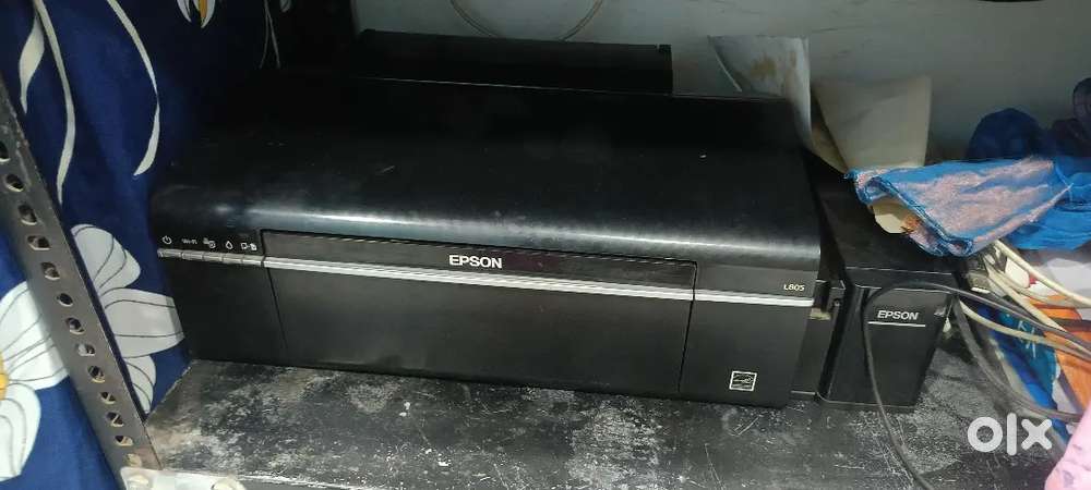Glossy printer.  L8O5 Price 12000