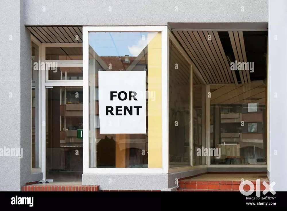 shop for rent with signboards and car parking