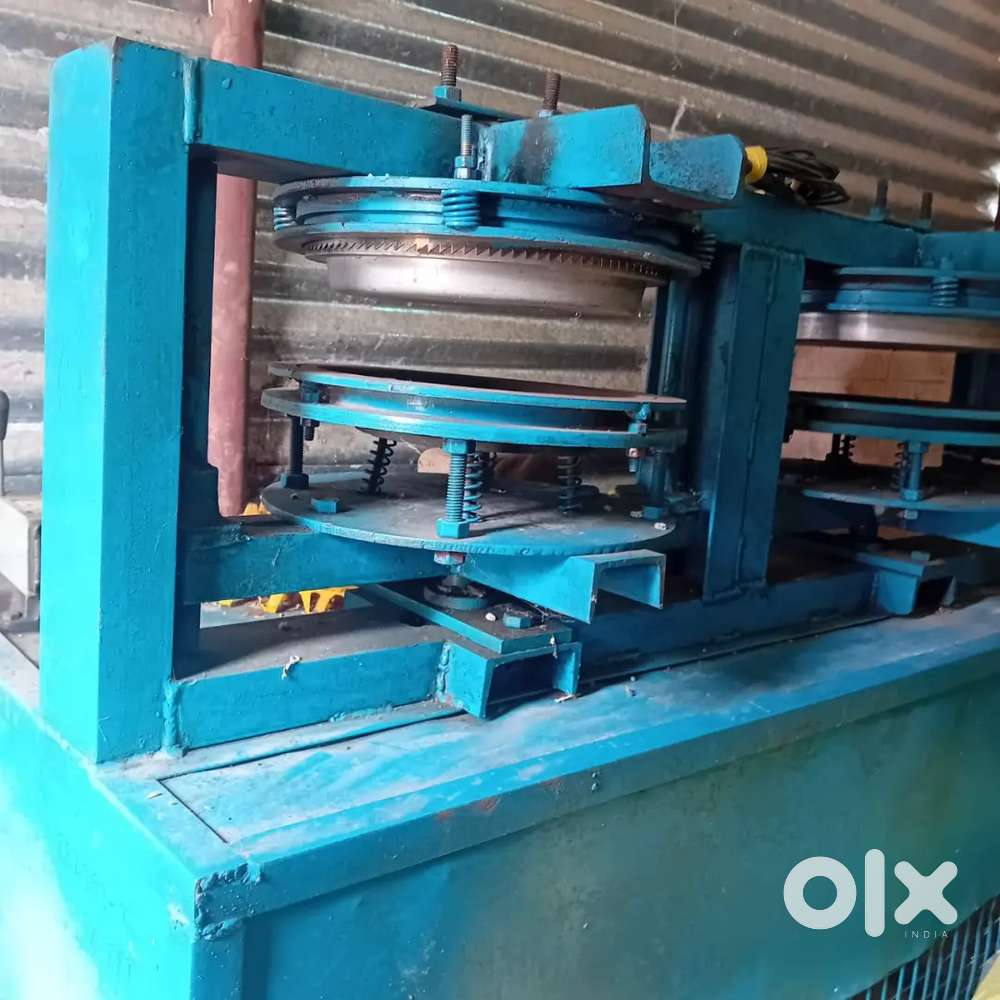 Plate pressing machine