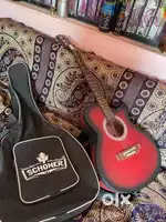 Electronic acoustic guitar with bag and picks