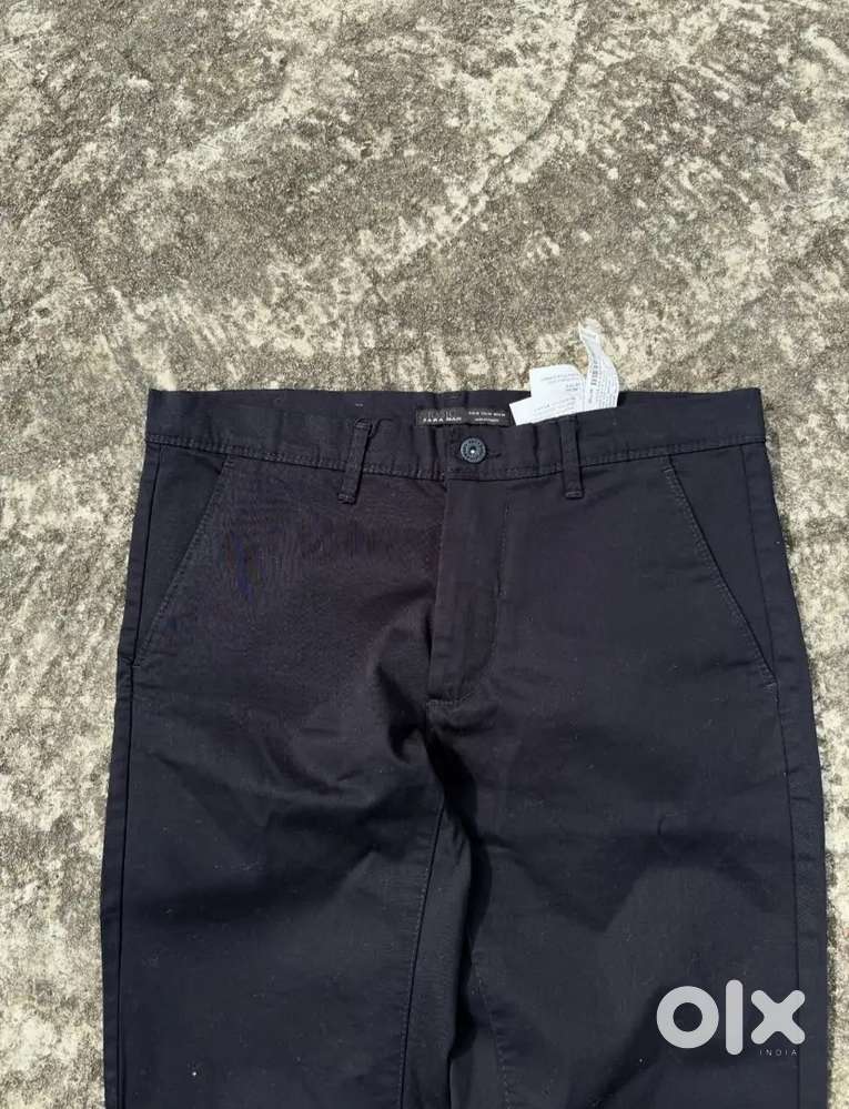 Men Zara pants next to new