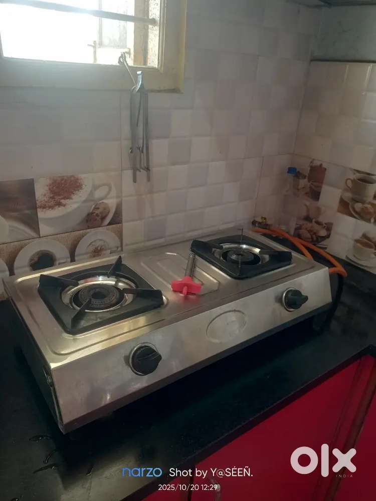 LPG cylinder with stove.  Working condition.  Vacating Home