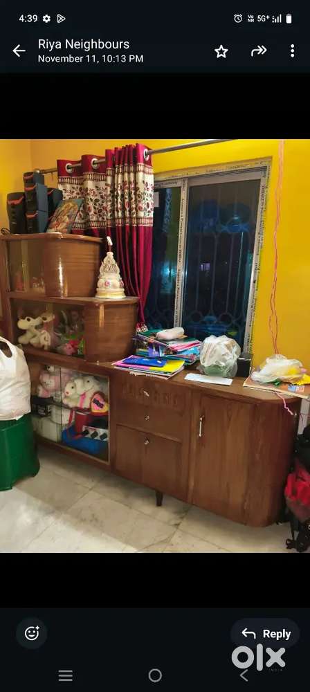 Wooden showcase& storage cabinet . good condition , urgent sale