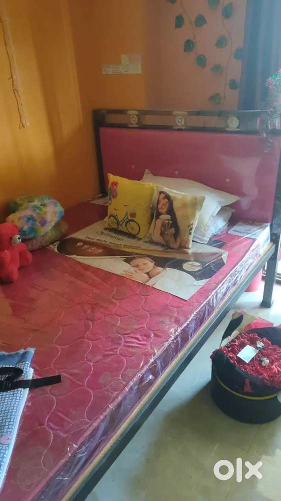 Iron double bed with mattress.only 10 days used