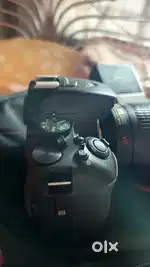 Nikon D5600 body + Nikkor 55–200mm VR lens
