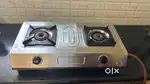 Gas stove with regulator