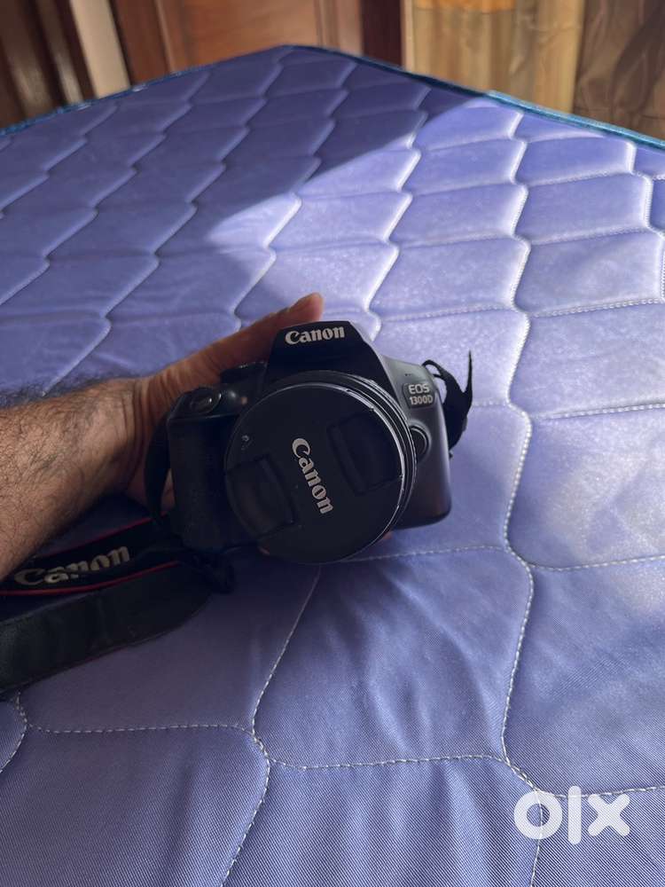 Canon 1300 D (DSLR )