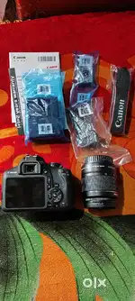 Canon 1500 D with bag memory & card adovter Good condition