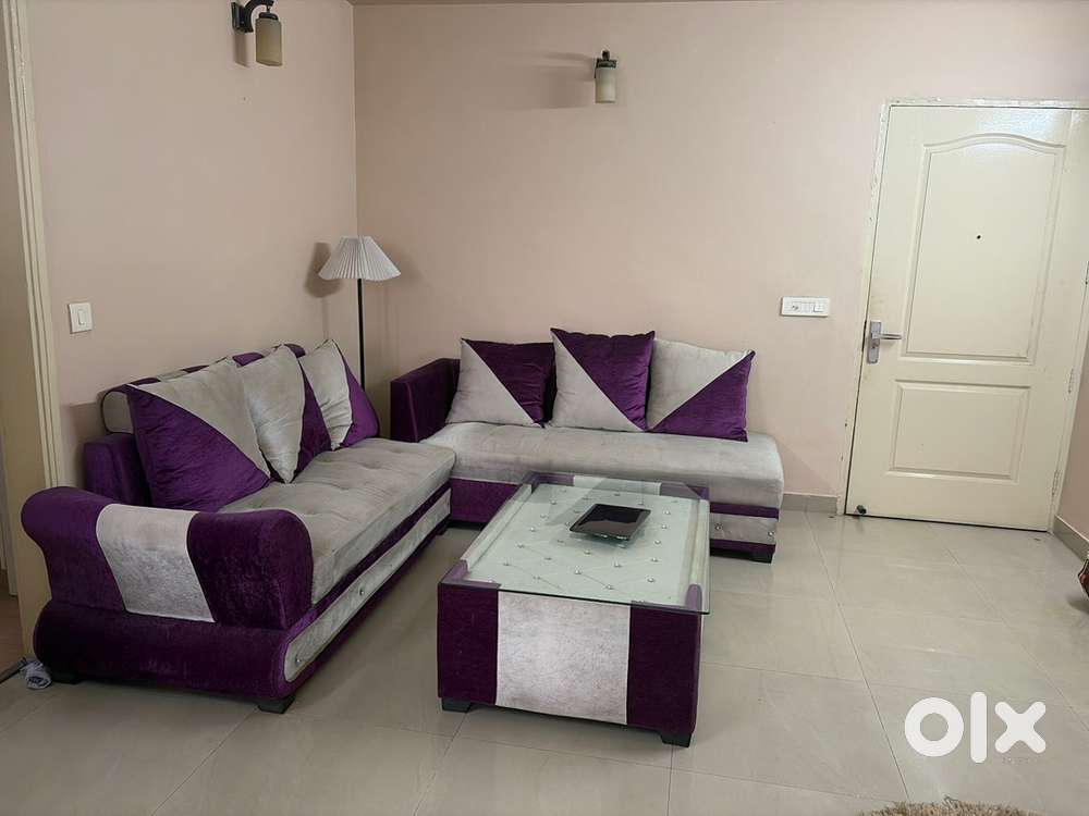 L Shape Sofa with Two Puffy and center table