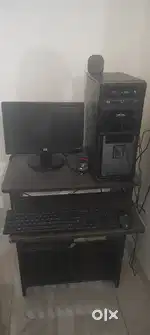 Desktop With Speakers And Computer Table
