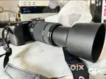 Sony Alfa A6000 mirrorless professional camera with telephoto lens